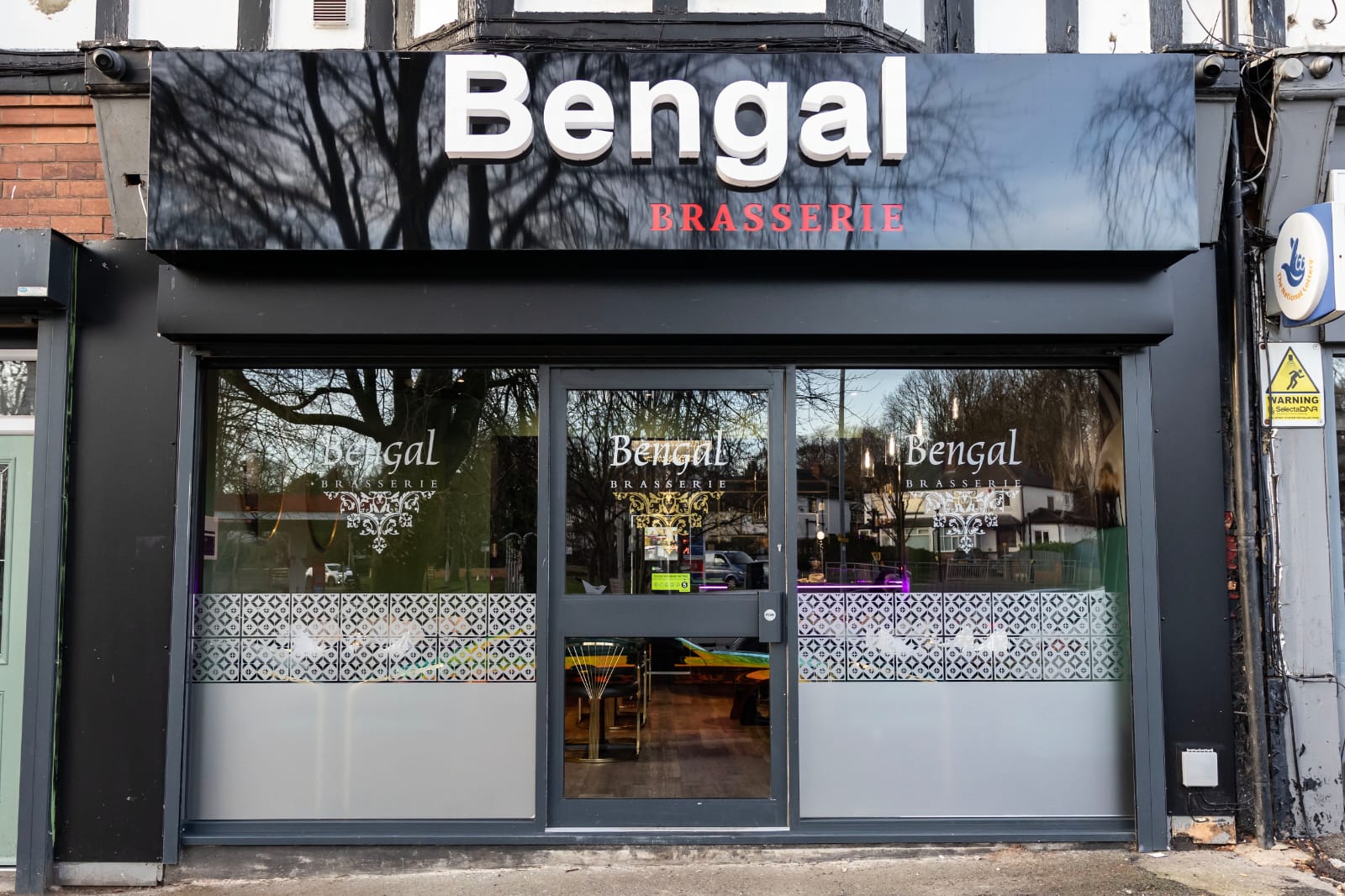 Picture of the shop front of the Bengal Brasserie Leeds Moortown branch.