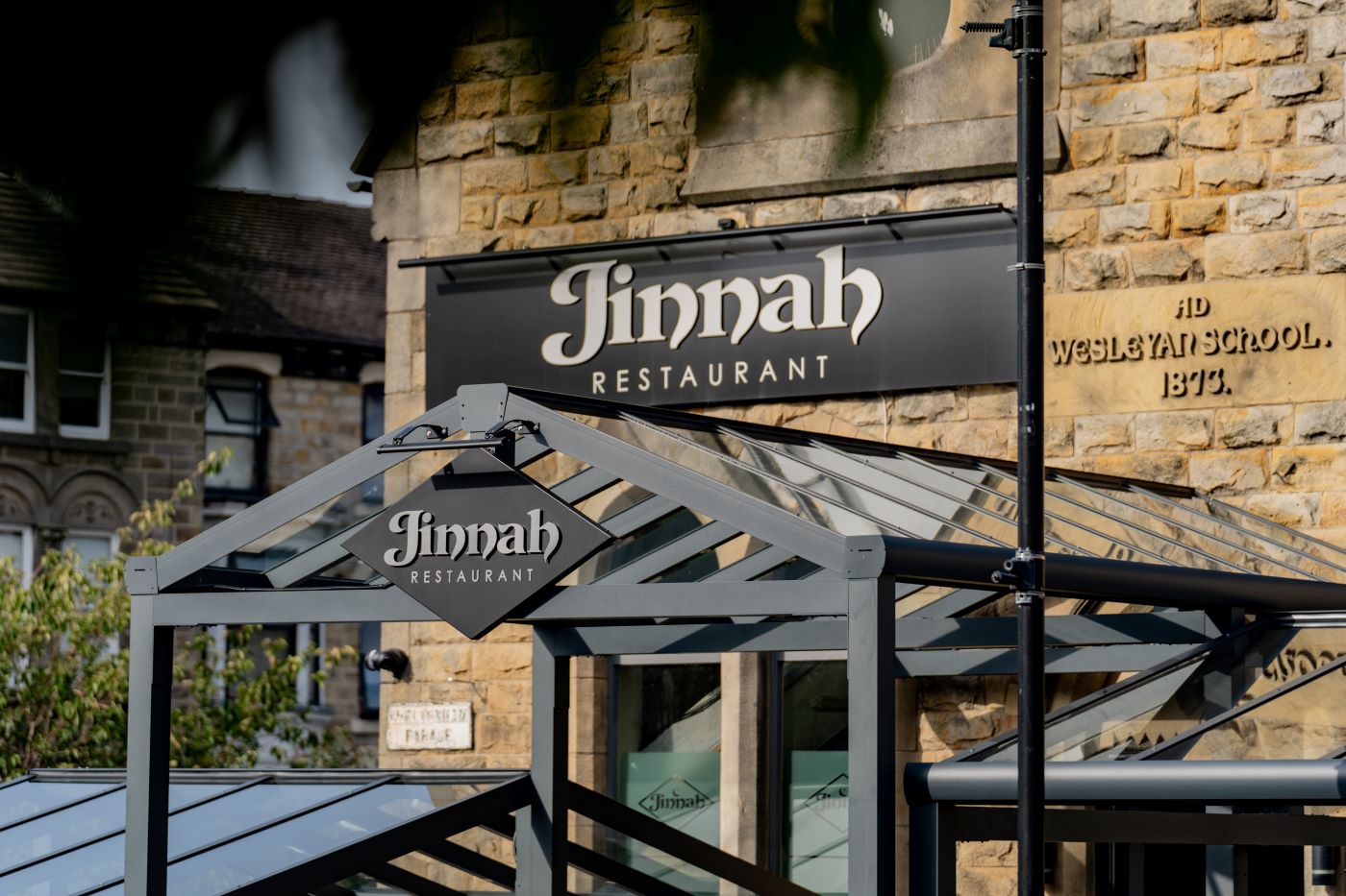 Jinnah Harrogate Outside Both Signs Homepage Website Banner